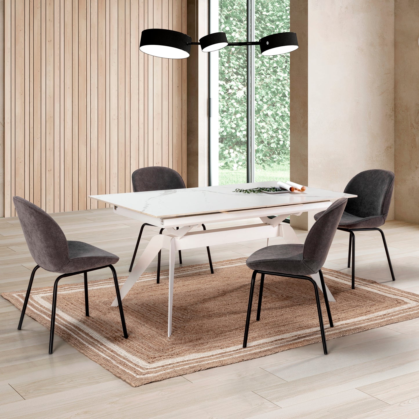 Mesa comedor Lula, rectangular y extensible, en color blanco con pie metálico blanco. Fabricada de cerámica y metal.