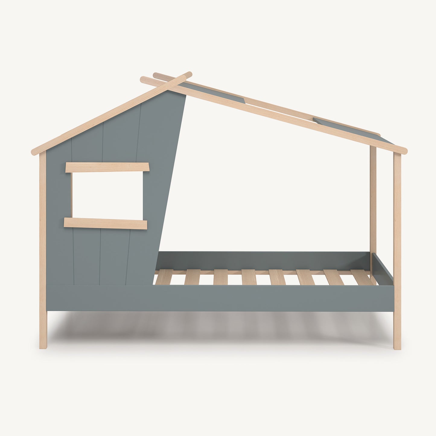 Cama infantil tipo casa verde con estructura de madera y ventana