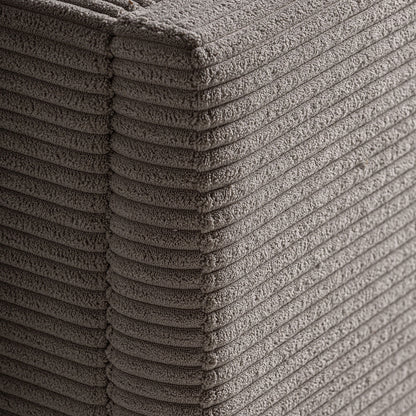 Textura de tejido acanalado suave tipo pana en cama tapizada beige