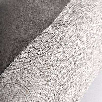 Cama tapizada en tejido jacquard con tonos marrones y beige