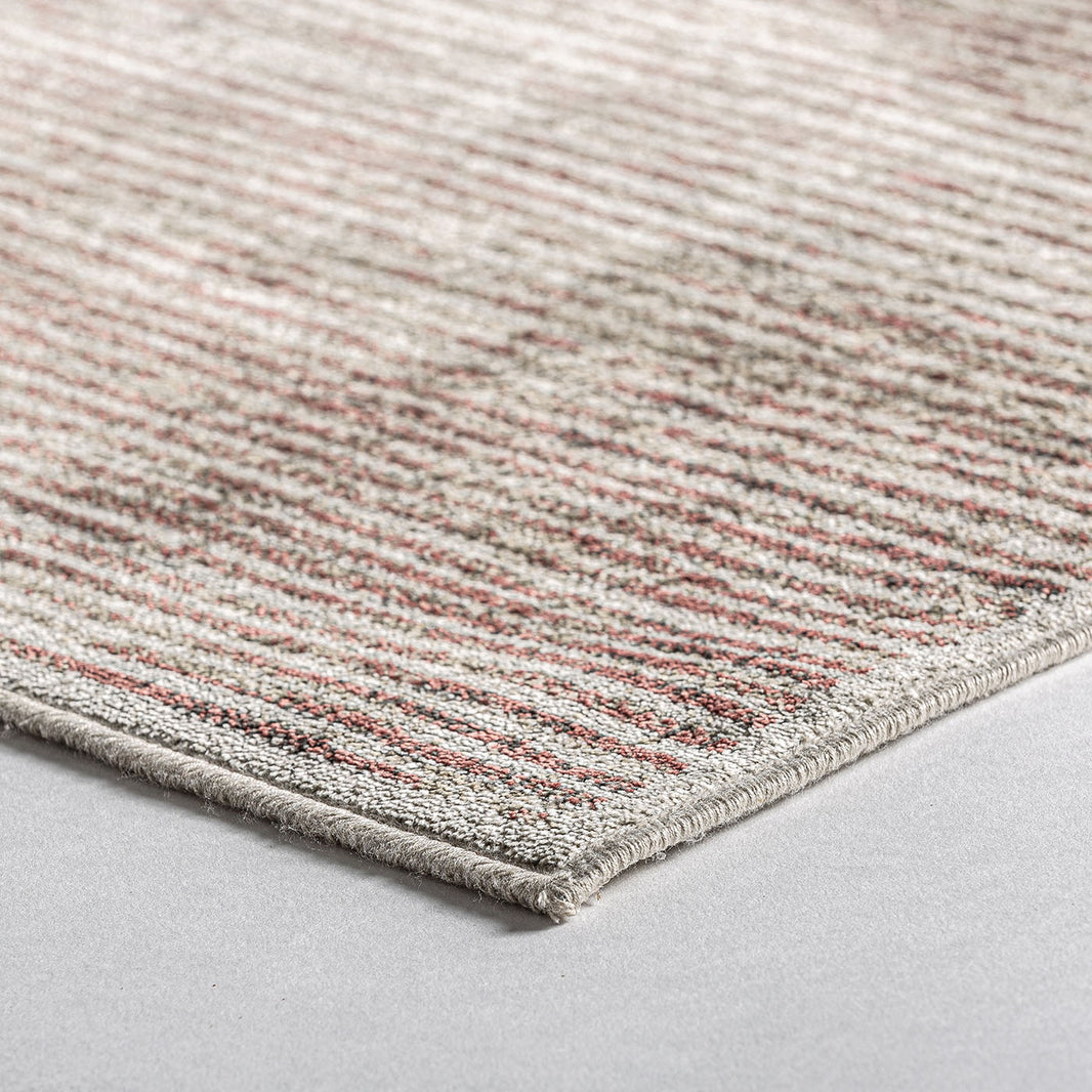 Alfombra de tonos cálidos