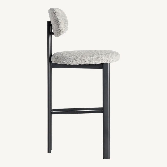 Taburete Koru gris y negro con tejido aterciopelado repelente al agua