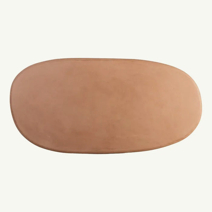 Mesa contemporánea ovalada de acabado en microcemento para comedor o salón