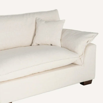 Sofá 4 plazas en color crema, de madera y tejido de lino