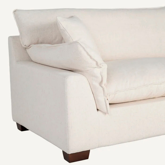 Sofá 4 plazas en color crema, de madera y tejido de lino