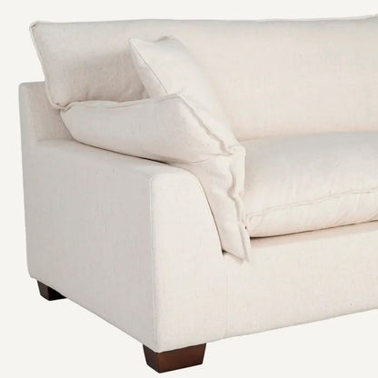 Sofá 4 plazas en color crema, de madera y tejido de lino