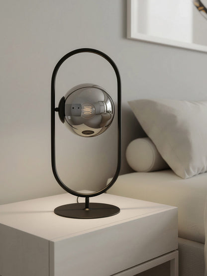 Lámpara de mesa de acero negro con esfera vidrio ahumado 