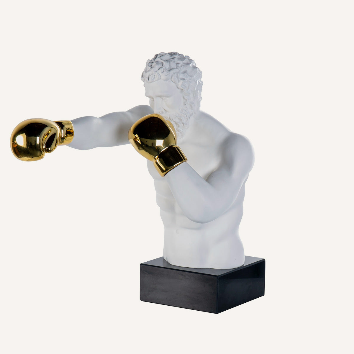 Figura boxeador blanco y dorado, en metal combinado con mármol