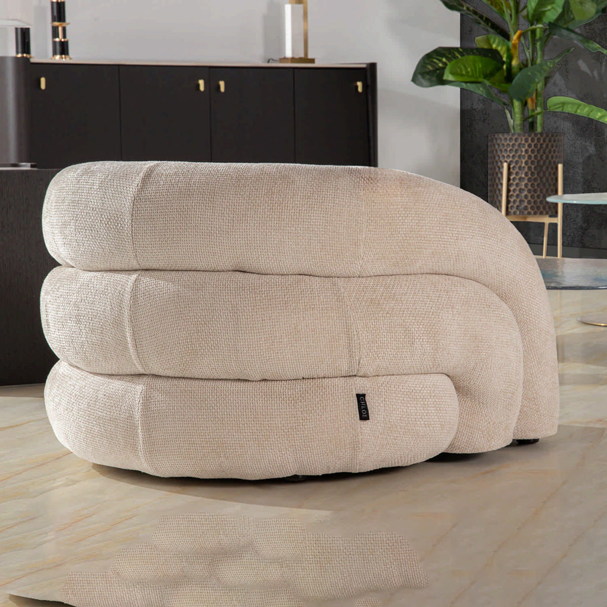 Sillón curvo en chenilla beige Flux