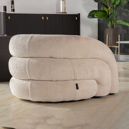 Sillón curvo en chenilla beige Flux
