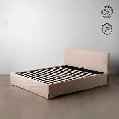Cama doble tapizada con canapé y cabezal, de textura suave color beige. Apta colchón 180x200 cm